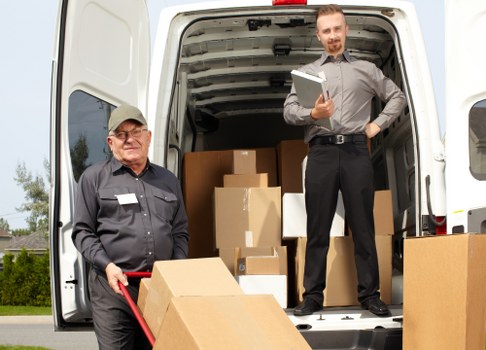 Same day removals team loading furniture in Putney