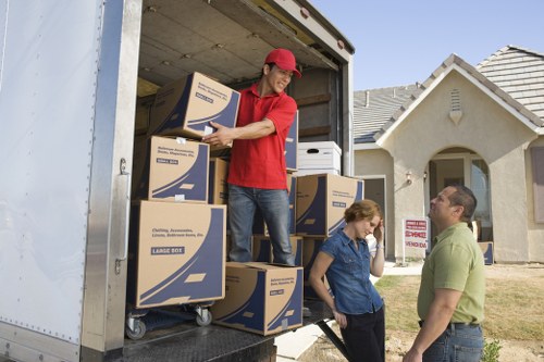 Moving van and team coordinating access for a Putney flat or house move