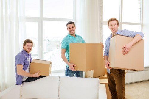 Household items being loaded for a Putney home removal service