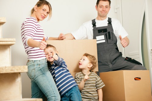 Unpacking boxes in a Putney flat after moving day
